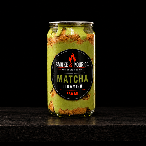 Matcha tiramisu on dark wood board, pure black background
